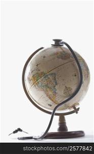 Close-up of a stethoscope on a globe
