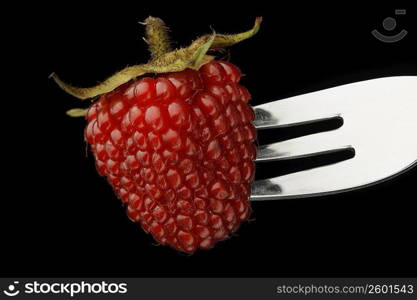 Close-up of a strawberry on a fork