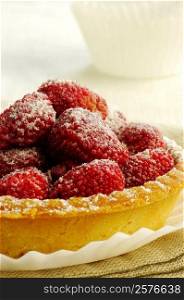 Close-up of a strawberry tart in a plate