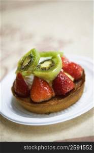 Close-up of a strawberry tart on a plate