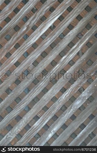 Close-up of a striped wooden fence