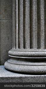 Close-up of a strong supportive pillar base.