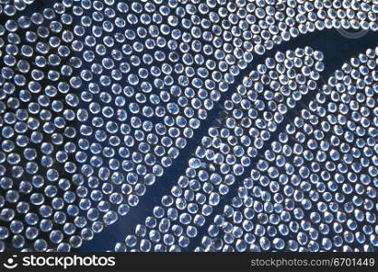 Close-up of a surface of clear beads