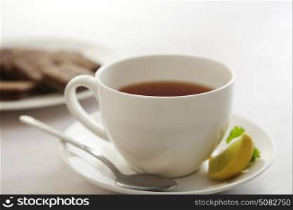 Close-up of a tea with lemon