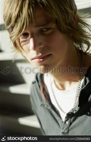 Close-up of a teenage boy looking sideways