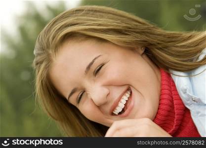 Close-up of a teenage girl laughing