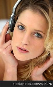 close-up of a teenage girl listening music