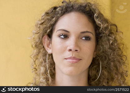 Close-up of a teenage girl looking away