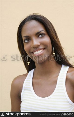 Close-up of a teenage girl looking cheerful