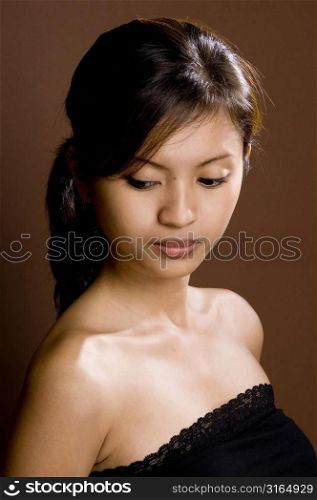 Close-up of a teenage girl looking down