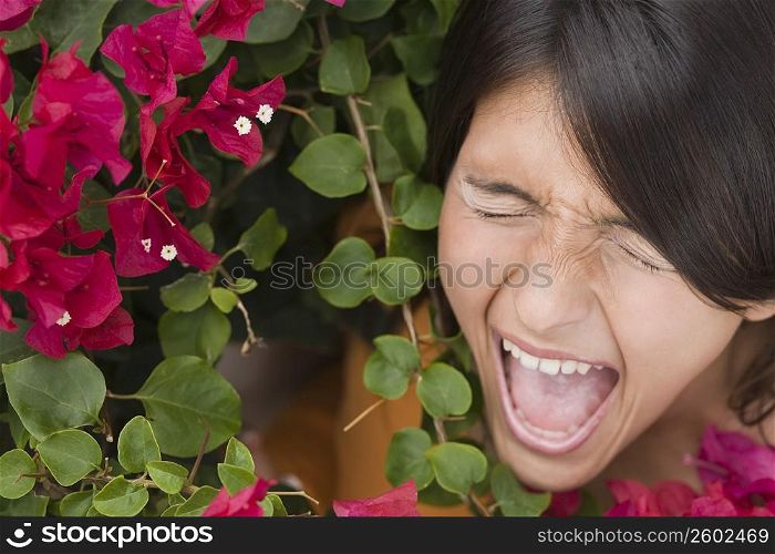Close-up of a teenage girl shouting
