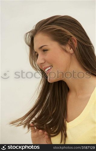 Close-up of a teenage girl smiling