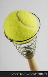 Close-up of a tennis ball on an egg beater
