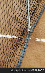 Close-up of a tennis net on a tennis court