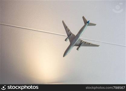 Close-up of a toy airplane hanging in a house. Close-up of a toy airplane hanging in a house modern