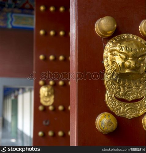 Close-up of a traditional Chinese red door, Hall of Dispelling Clouds, Longevity Hill, Summer Palace, Haidian District, Beijing, China