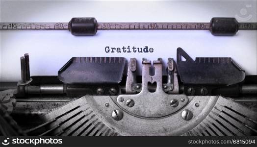 Close-up of a vintage typewriter, old and rusty, gratitude