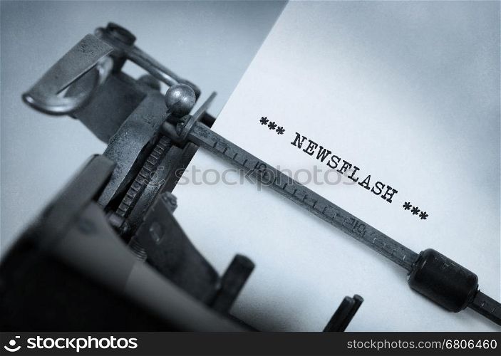 Close-up of a vintage typewriter, old and rusty, newsflash