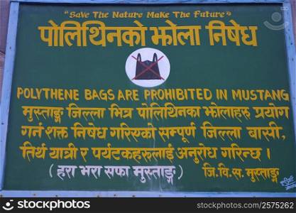 Close-up of a warning information board, Annapurna Range, Himalayas, Nepal