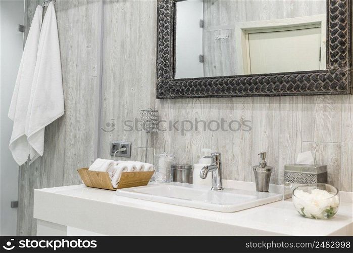 Close-up of a washbasin with a faucet in the bathroom. interior of the shower room