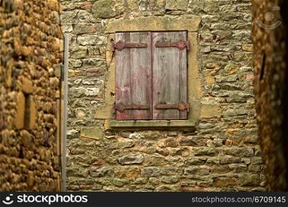 Close-up of a window on a stone wall