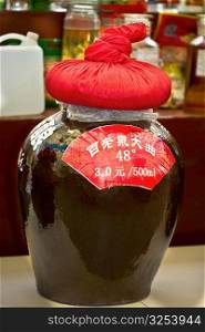 Close-up of a wine jar at a market stall, Tai&acute;an, Shandong Province, China