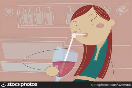 Close-up of a woman drinking with a straw