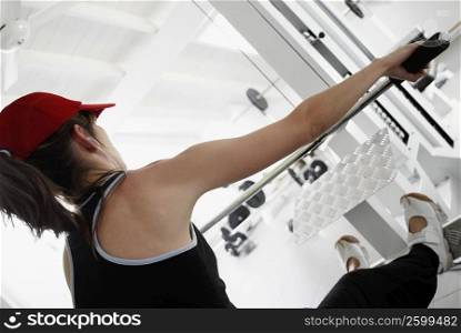 Close-up of a woman exercising in a gym
