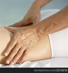 Close-up of a woman getting a back massage