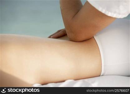 Close-up of a woman getting a back massage