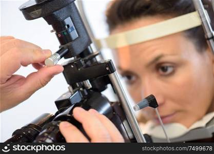 close-up of a woman having her eyes examined