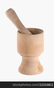 Close-up of a wooden mortar and pestle