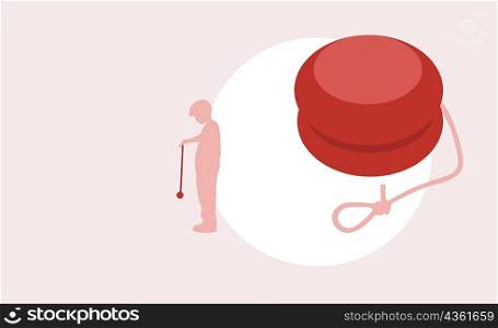 Close-up of a yo-yo with the silhouette of a child playing with a yo-yo in the background