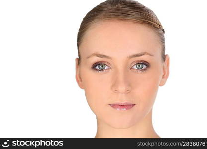 close-up of a young blonde woman smiling