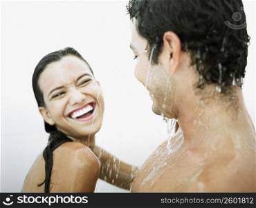 Close-up of a young couple having a bath