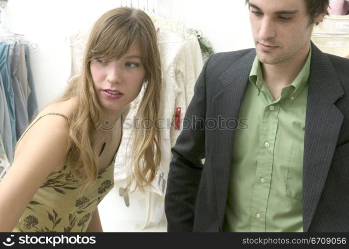 Close-up of a young couple in a clothing store