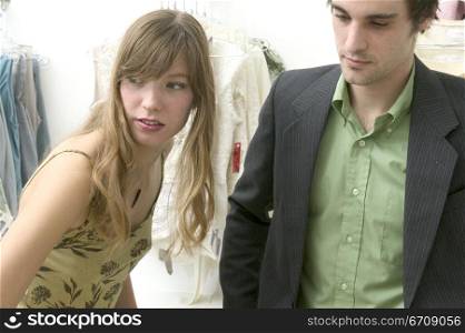 Close-up of a young couple in a clothing store