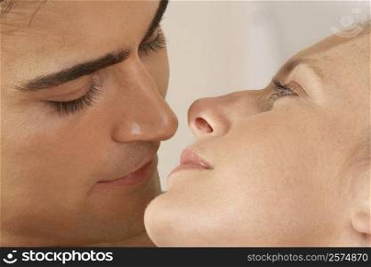 Close-up of a young couple kissing