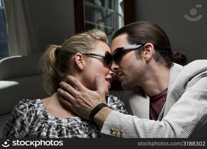 Close-up of a young couple kissing each other