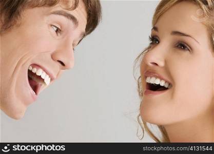 Close-up of a young couple laughing
