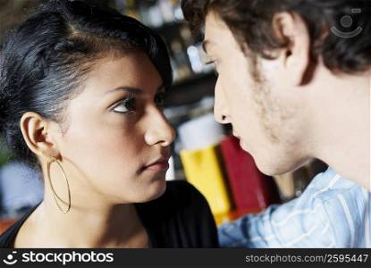 Close-up of a young couple looking at each other