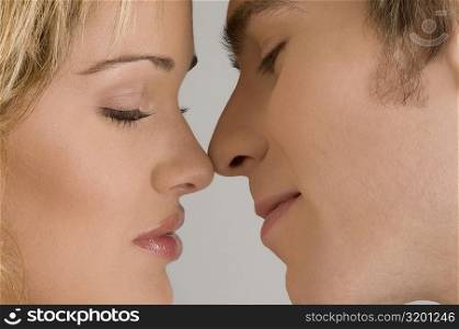 Close-up of a young couple romancing