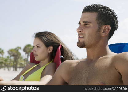 Close-up of a young couple sitting