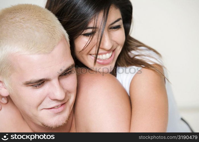 Close-up of a young couple smiling