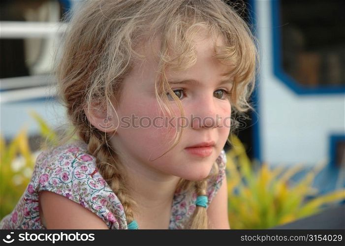 Close-up of a young girl (12-13), Moorea, Tahiti, French Polynesia, South Pacific