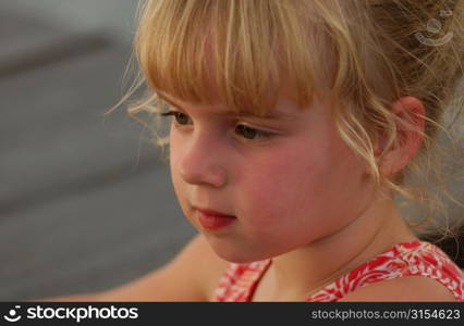 Close-up of a young girl (6-8), Moorea, Tahiti, French Polynesia, South Pacific