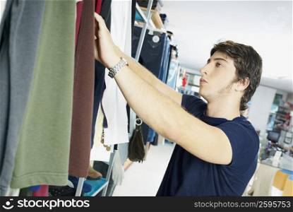 Close-up of a young man in a clothing store