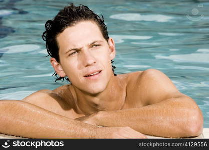 Close-up of a young man in a swimming pool