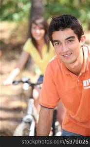 close-up of a young man on a bike