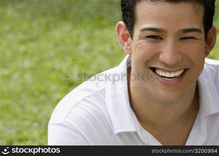 Close-up of a young man smiling